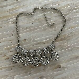 Like new statement necklace. Silver chain.